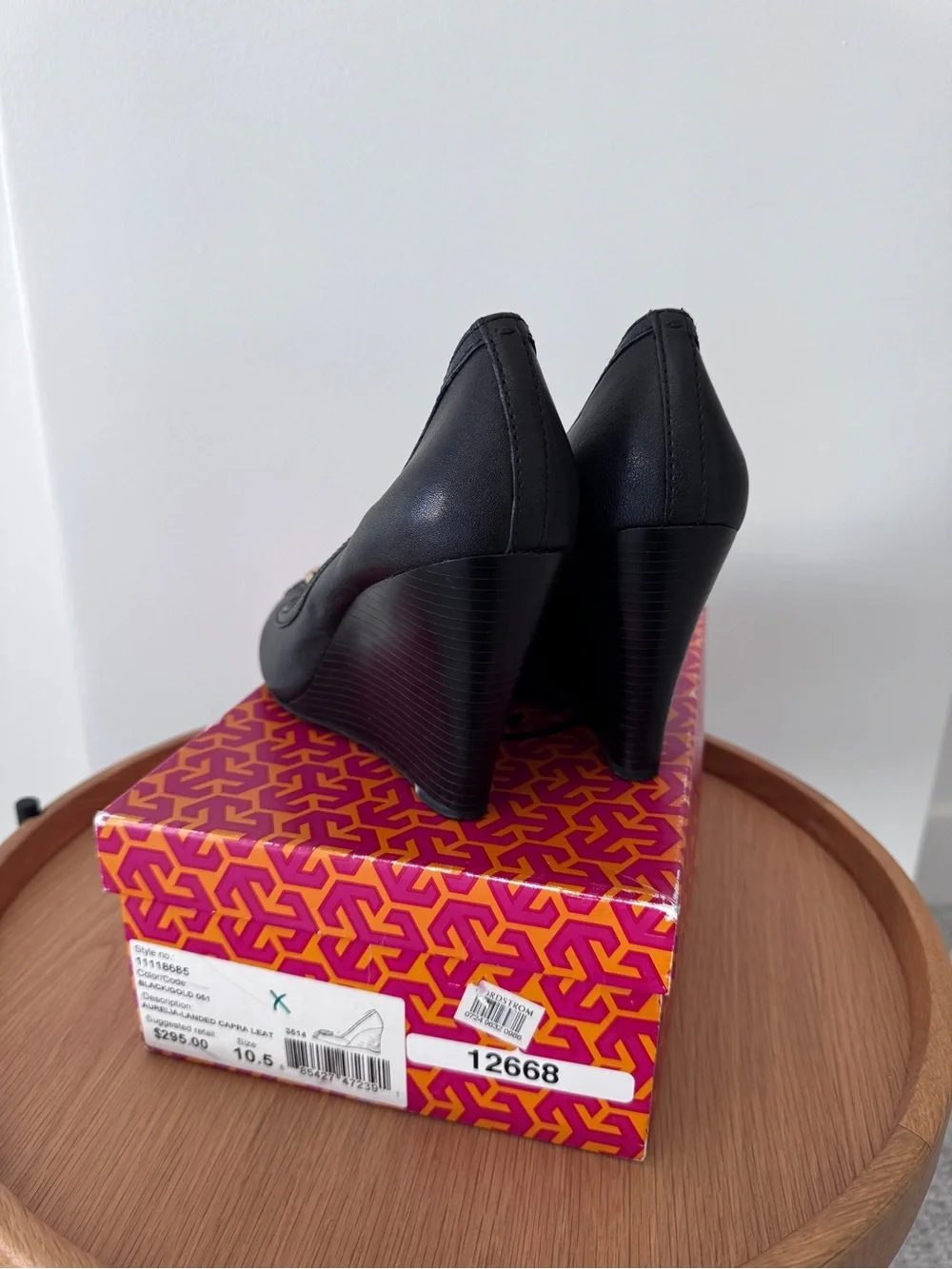 Tory Burch Black Peep-Toe Wedge Pumps with Gold Logo Medallion